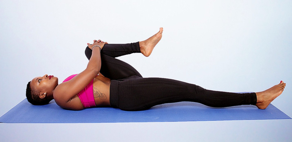 How To Become Flexible :  Knee-chest stretch 