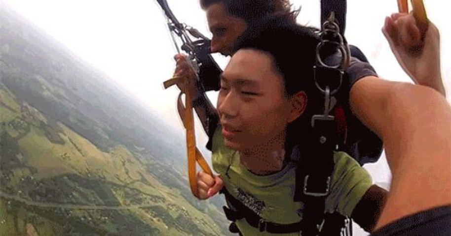 Guy Passing out during 360 Sky Diving 