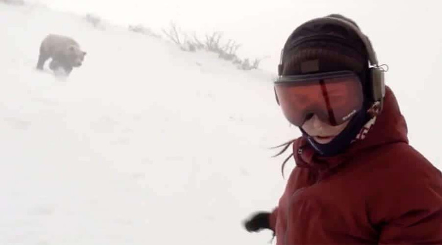 Watch how this snow boarder is chased by the Snow bear 