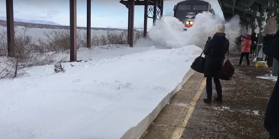 Train Hitting Massive Mound of Snow in Slow mo