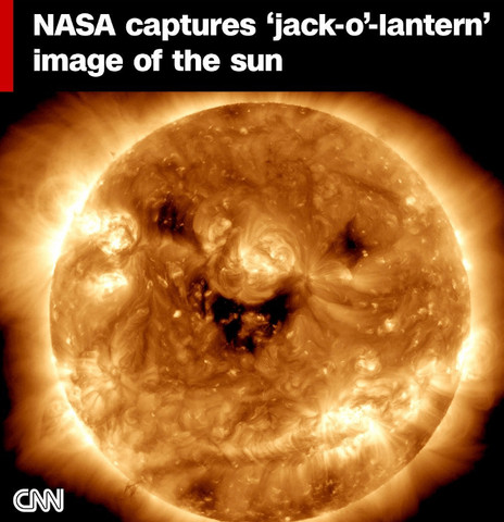 The sun dressed up as a jack-o
