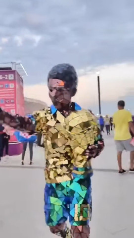 Brazilian football fan covering himself with mirrors!!!!