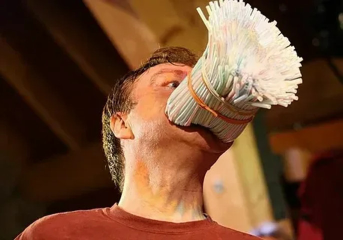 Dumbest World Records Ever: Most straws stuffed in the mouth