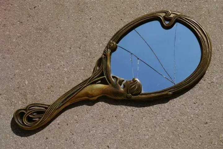 Super Weird Superstitions: Breaking a mirror