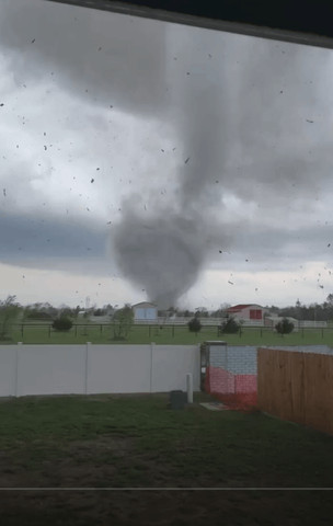Andover Tornado swallows a yard