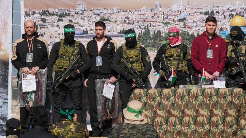 Three Israeli hostages and hundreds of Palestinian detainees freed after dispute threatened Gaza ceasefire | CNN